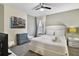 Spacious bedroom with a comfortable queen-size bed and plush bedding at 8911 Stinger Dr, Champions Gate, FL 33896