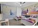 Charming bedroom with Frozen-themed decor and twin beds at 8911 Stinger Dr, Champions Gate, FL 33896