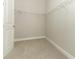 Large walk-in closet with wire shelving at 1332 Arklow Cir, Ormond Beach, FL 32174