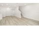 Spacious living room with hardwood floors and open layout at 6119 Metrowest Blvd # 106, Orlando, FL 32835