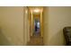 Bright hallway with doors to bedrooms at 1080 Condor Dr, Haines City, FL 33844