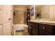 Bathroom with tub, shower, vanity, and granite countertop at 1080 Condor Dr, Haines City, FL 33844