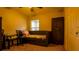 Bedroom with daybed, desk, and closet at 1080 Condor Dr, Haines City, FL 33844