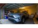 Attached garage with space for a car and storage at 1080 Condor Dr, Haines City, FL 33844