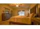 Main bedroom with plush bed and access to backyard at 1080 Condor Dr, Haines City, FL 33844