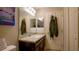 Bathroom with vanity, mirror and towel hooks at 1080 Condor Dr, Haines City, FL 33844