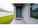 Home features a welcoming front door and entryway at 1080 Condor Dr, Haines City, FL 33844