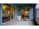 Covered screened porch with access to bedroom and living area at 1080 Condor Dr, Haines City, FL 33844