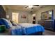 Spacious bedroom with ensuite bathroom access and large dresser at 1080 Condor Dr, Haines City, FL 33844