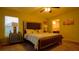 Main bedroom with ensuite bathroom and large bed at 1080 Condor Dr, Haines City, FL 33844