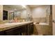 Double vanity bathroom with soaking tub and shower at 1080 Condor Dr, Haines City, FL 33844