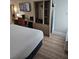 Hotel bedroom with a king-size bed and built-in wardrobe at 3000 Maingate Ln # 522, Kissimmee, FL 34747