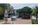 Community pool with patio furniture at 13103 Mulberry Park Dr # 824, Orlando, FL 32821