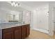 Primary bathroom with granite vanity, large shower, and a soaking tub at 4949 Olivia Ct, St Cloud, FL 34772