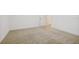 Simple bedroom with neutral carpet and an ensuite bathroom at 4949 Olivia Ct, St Cloud, FL 34772