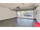 Spacious garage with overhead storage and room for two cars at 9076 Sw 95Th Ave # 9076, Ocala, FL 34481