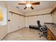Home office with built-in desk and ample shelving at 9076 Sw 95Th Ave # 9076, Ocala, FL 34481