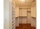 Spacious walk-in closet with ample shelving and hanging space at 9076 Sw 95Th Ave # 9076, Ocala, FL 34481