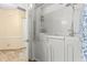 Bathroom with walk-in tub, shower, and tiled walls at 9076 Sw 95Th Ave # 9076, Ocala, FL 34481