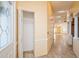 Spacious entryway with a coat closet and view into the living area at 9076 Sw 95Th Ave # 9076, Ocala, FL 34481