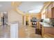 Updated kitchen featuring stainless steel appliances and light wood cabinetry at 9076 Sw 95Th Ave # 9076, Ocala, FL 34481