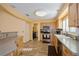 Bright and spacious kitchen with ample counter space and a view to the living area at 9076 Sw 95Th Ave # 9076, Ocala, FL 34481