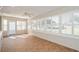 Spacious sunroom with tiled floors and large windows at 9076 Sw 95Th Ave # 9076, Ocala, FL 34481