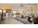 Open living room and kitchen with tile floors and neutral decor at 9076 Sw 95Th Ave # 9076, Ocala, FL 34481
