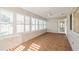 Sunroom featuring tile flooring and white shutters at 9076 Sw 95Th Ave # 9076, Ocala, FL 34481