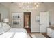 Main bedroom with ensuite bathroom access and calming decor at 4162 Grande Brick Loop # 27, Orlando, FL 32837