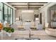Open kitchen with island, marble countertops and lake view at 4162 Grande Brick Loop # 27, Orlando, FL 32837