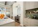 Modern kitchen with island, custom cabinetry and breakfast bar at 4162 Grande Brick Loop # 27, Orlando, FL 32837