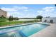 Resort-style pool with spa and scenic golf course views at 4162 Grande Brick Loop # 27, Orlando, FL 32837