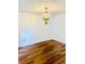 Spacious dining room with hardwood floors and chandelier at 1856 Emily Dr, Winter Haven, FL 33884