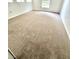 Large bedroom with neutral carpet and a window at 1856 Emily Dr, Winter Haven, FL 33884