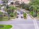 Community entrance with landscaped medians and gate at 13524 Turtle Marsh Loop # 638, Orlando, FL 32837