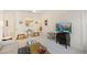 Living room featuring a TV, small table and chairs, and comfortable seating at 13524 Turtle Marsh Loop # 638, Orlando, FL 32837