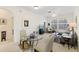 Bright living room featuring a dining area and comfortable seating at 13524 Turtle Marsh Loop # 638, Orlando, FL 32837