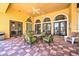 Relaxing community patio with comfortable seating at 742 Orange Cosmos Blvd, Davenport, FL 33837