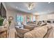Relaxing living room with comfortable seating and access to the pool area at 742 Orange Cosmos Blvd, Davenport, FL 33837