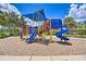 Community playground with shaded play structures at 742 Orange Cosmos Blvd, Davenport, FL 33837