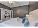 Spacious main bedroom with a king bed and French doors to a private area at 742 Orange Cosmos Blvd, Davenport, FL 33837
