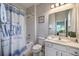 Bathroom with shower and tub at 742 Orange Cosmos Blvd, Davenport, FL 33837