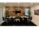 Elegant dining room with a large table and statement lighting at 7405 Marker Ave, Kissimmee, FL 34747