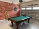 Game room featuring a pool table and garage door access at 7405 Marker Ave, Kissimmee, FL 34747