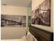 Bedroom with a full-size bed and city view art at 7405 Marker Ave, Kissimmee, FL 34747