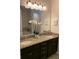 Double vanity with granite countertops at 7405 Marker Ave, Kissimmee, FL 34747