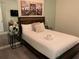 Bedroom with a full-size bed and decor at 7405 Marker Ave, Kissimmee, FL 34747