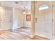 Bright entryway with light wood flooring at 28 Golf Villa Dr, Port Orange, FL 32128