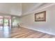Bright living room with hardwood floors and a large mirror at 28 Golf Villa Dr, Port Orange, FL 32128